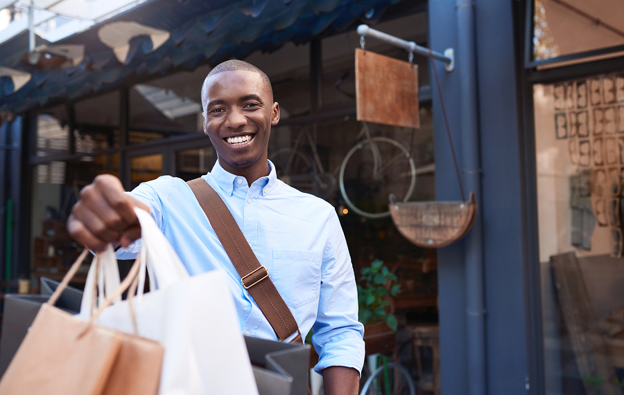 Man holding shopping bags