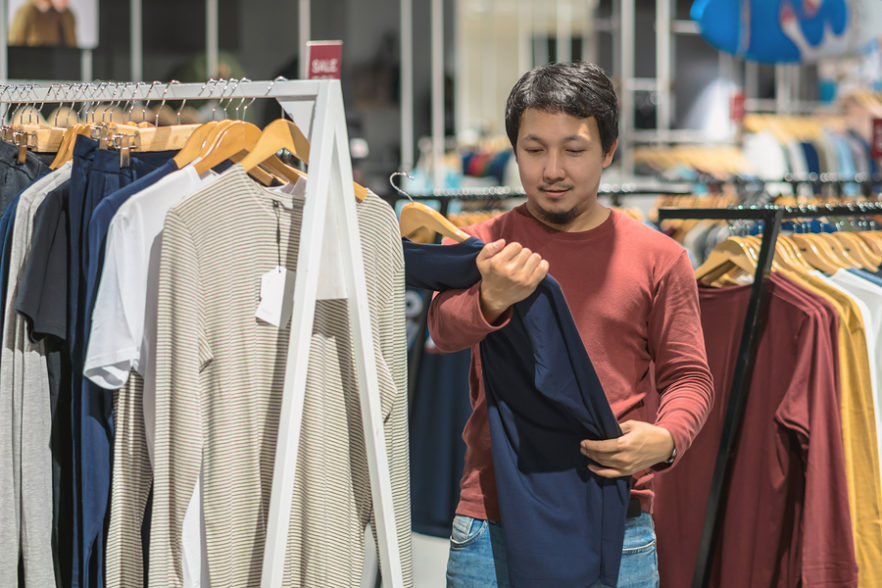 Man shopping in a clothing store